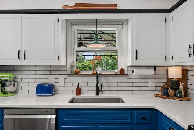 1805 Needmore Rd, Clarksville, TN 37042 - kitchen featuring stainless steel dishwasher, white cabinets, and blue cabinetry
