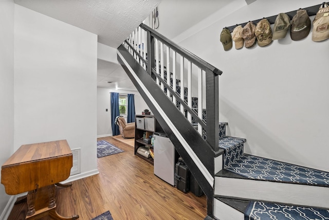 1805 Needmore Rd, Clarksville, TN 37042 - stairway with wood finished floors and baseboards