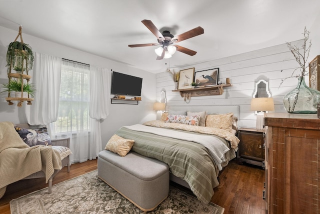 1805 Needmore Rd, Clarksville, TN 37042 - bedroom with wood finished floors, wooden walls, and ceiling fan