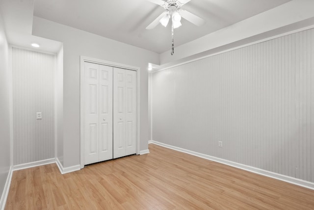 1805 Needmore Rd, Clarksville, TN 37042 - unfurnished bedroom with light wood finished floors, a closet, and ceiling fan