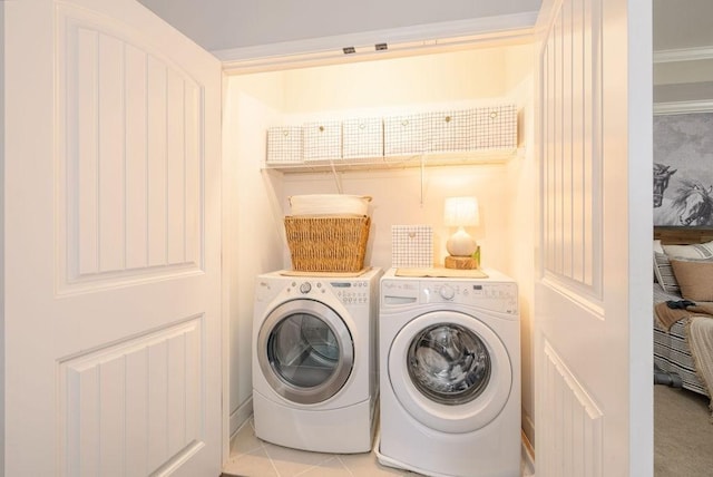 6067 Keats St, Franklin, TN 37064 - laundry area featuring washing machine and clothes dryer and carpet
