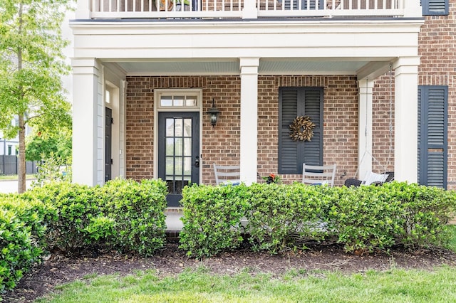 6067 Keats St, Franklin, TN 37064 - doorway to property with brick siding and a balcony