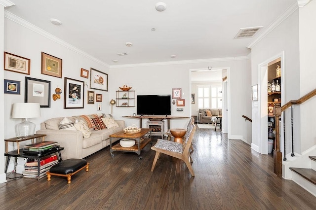 6067 Keats St, Franklin, TN 37064 - living area featuring wood finished floors, ornamental molding, and stairway