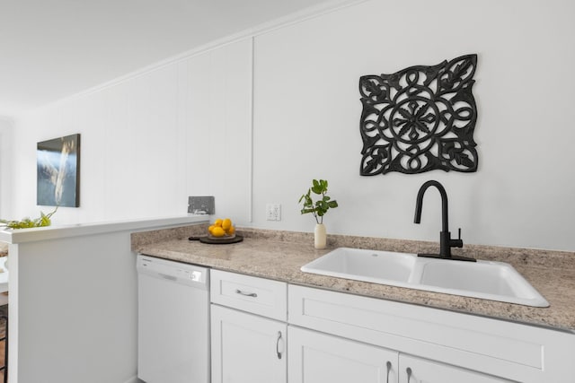 2020 Beech Ave Unit B13, Nashville, TN 37204 - kitchen featuring dishwasher, light countertops, and white cabinets