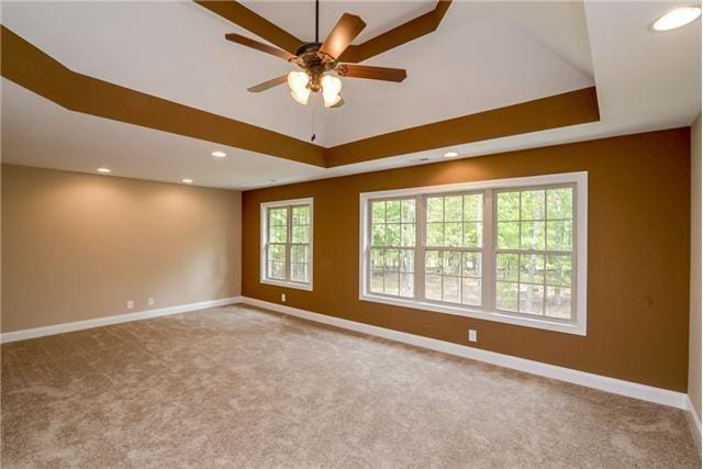 1789 Double R Blvd, Clarksville, TN 37042 - carpeted spare room featuring a raised ceiling, a ceiling fan, and recessed lighting