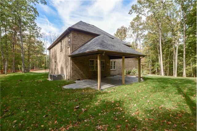 1789 Double R Blvd, Clarksville, TN 37042 - back of property with a patio area and a lawn