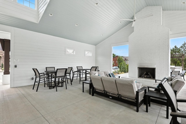 1000 Vintage Green Ln Unit 1201, Franklin, TN 37064 - view of patio featuring an outdoor living space with a fireplace, outdoor dining area, and a ceiling fan