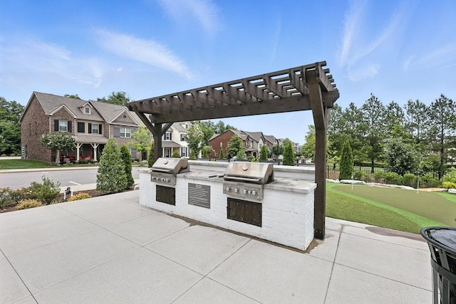 1000 Vintage Green Ln Unit 1201, Franklin, TN 37064 - view of patio / terrace with a putting green, an outdoor kitchen, and a pergola