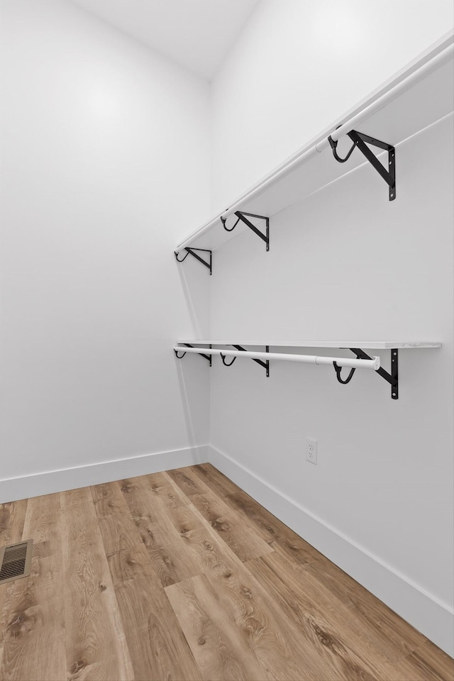 263 Eleanor Dr SW, Cleveland, TN 37311 - walk in closet featuring light wood finished floors