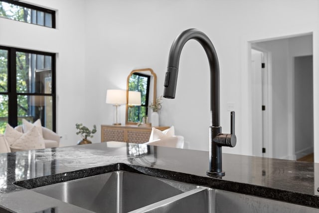 263 Eleanor Dr SW, Cleveland, TN 37311 - kitchen view of a sink and dark stone counters
