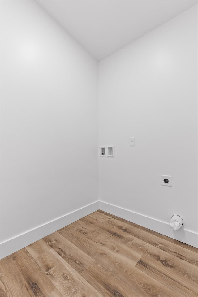 263 Eleanor Dr SW, Cleveland, TN 37311 - laundry area featuring hookup for an electric dryer, washer hookup, and light wood finished floors