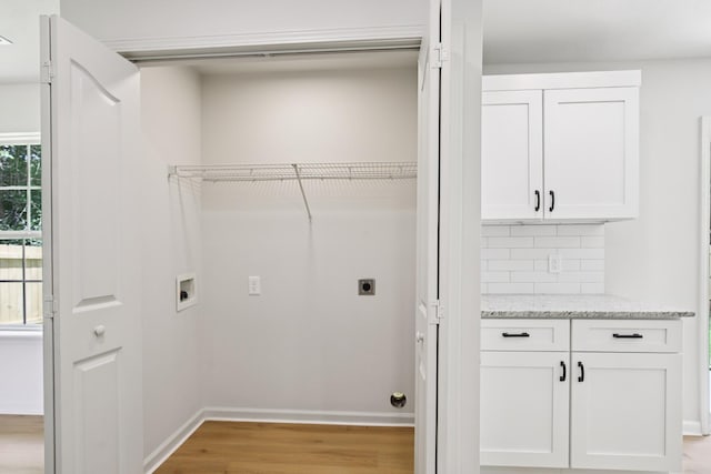 1033 Tom Hailey Blvd, La Vergne, TN 37086 - laundry room featuring hookup for an electric dryer, washer hookup, and light wood-style floors