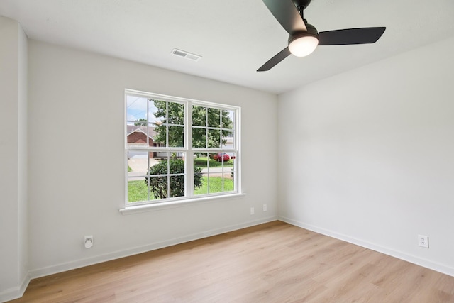 1033 Tom Hailey Blvd, La Vergne, TN 37086 - empty room with healthy amount of natural light, light wood-style floors, and a ceiling fan