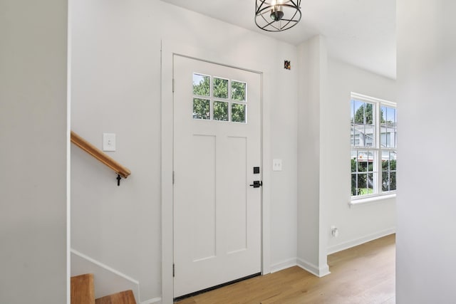 1033 Tom Hailey Blvd, La Vergne, TN 37086 - foyer featuring stairs, a chandelier, and light wood-type flooring