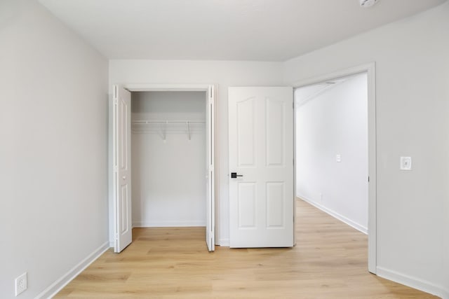 1033 Tom Hailey Blvd, La Vergne, TN 37086 - unfurnished bedroom with light wood-type flooring and a closet