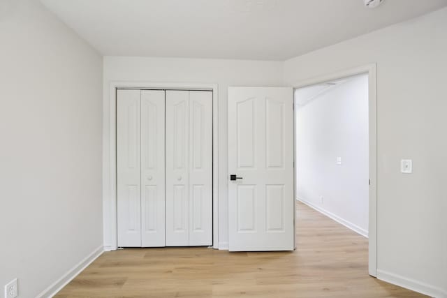 1033 Tom Hailey Blvd, La Vergne, TN 37086 - unfurnished bedroom featuring light wood-type flooring and a closet