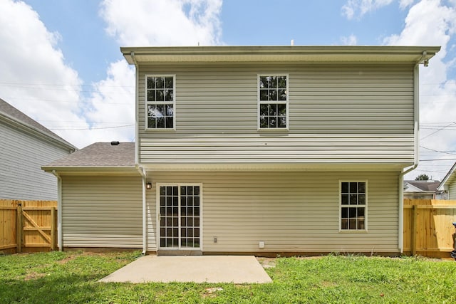 1033 Tom Hailey Blvd, La Vergne, TN 37086 - back of house with a patio area and a gate