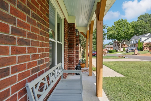 121 La View Rd, Hendersonville, TN 37075 - covered porch featuring a lawn and a residential view