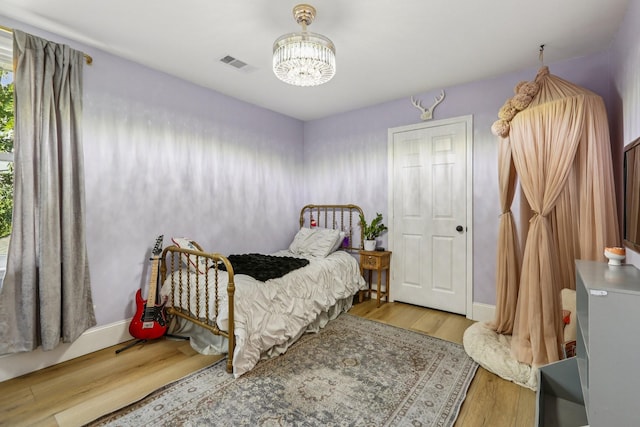 121 La View Rd, Hendersonville, TN 37075 - bedroom with a chandelier and wood finished floors