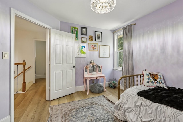 121 La View Rd, Hendersonville, TN 37075 - bedroom with a chandelier and light wood-style floors