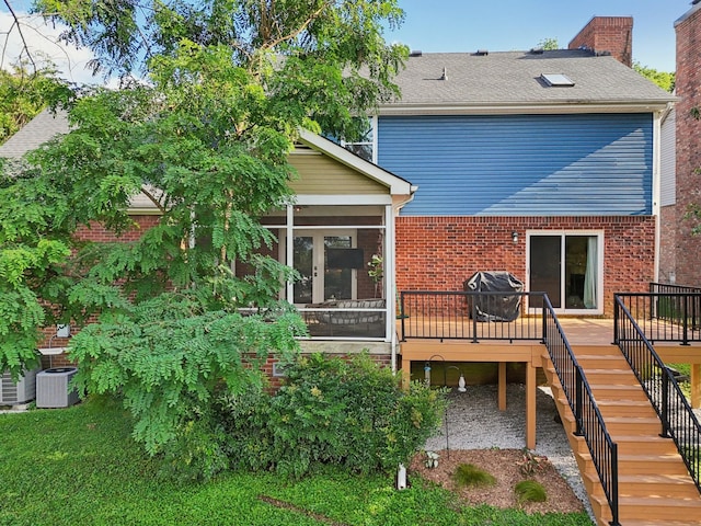 121 La View Rd, Hendersonville, TN 37075 - back of house featuring stairs, a wooden deck, a sunroom, brick siding, and a chimney