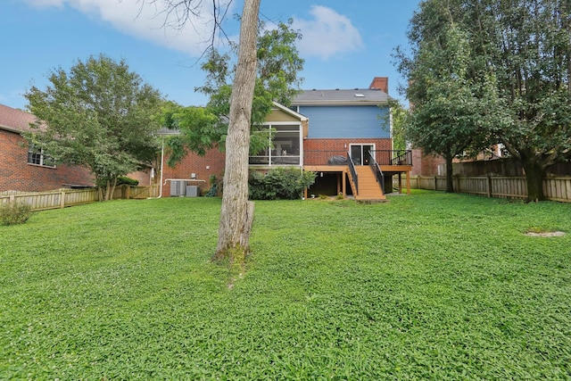 121 La View Rd, Hendersonville, TN 37075 - rear view of house featuring stairway, a sunroom, a chimney, a fenced backyard, and brick siding