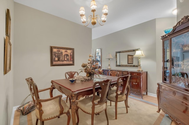 237 Woodmaker Ct, Nashville, TN 37214 - dining space featuring a chandelier and light wood-style floors