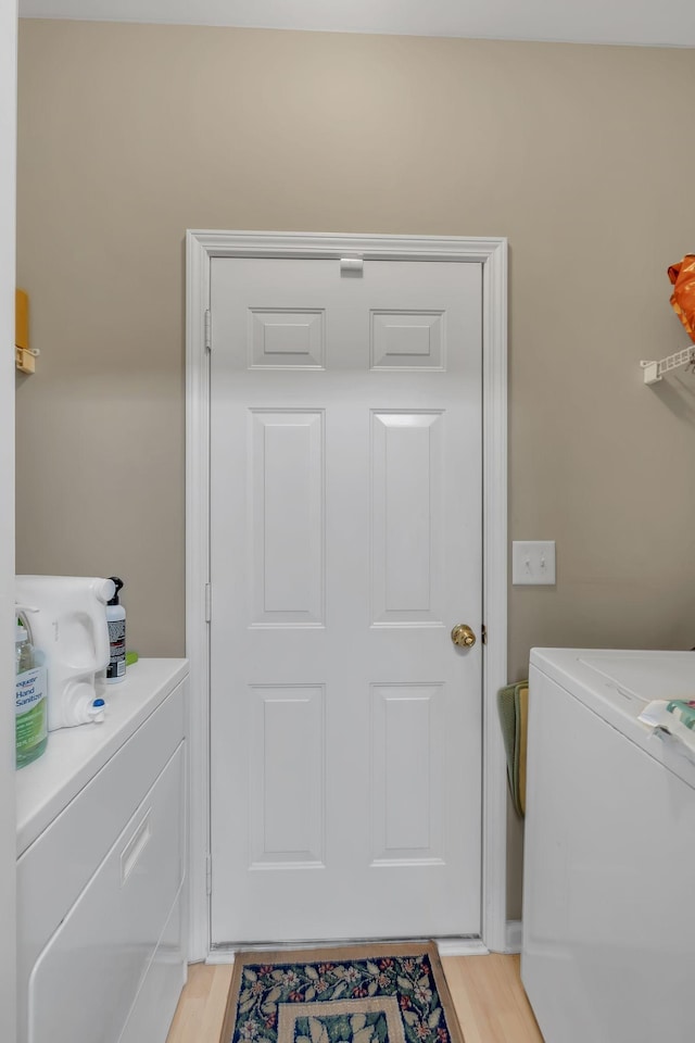 237 Woodmaker Ct, Nashville, TN 37214 - laundry area featuring washer and clothes dryer and light wood-style flooring