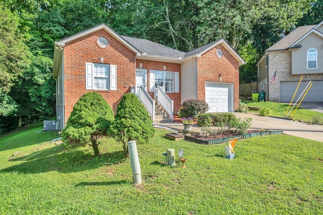 237 Woodmaker Ct, Nashville, TN 37214 - view of front of house with driveway, brick siding, a garage, and a front lawn