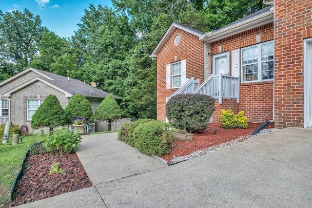 237 Woodmaker Ct, Nashville, TN 37214 - view of property exterior featuring brick siding and concrete driveway