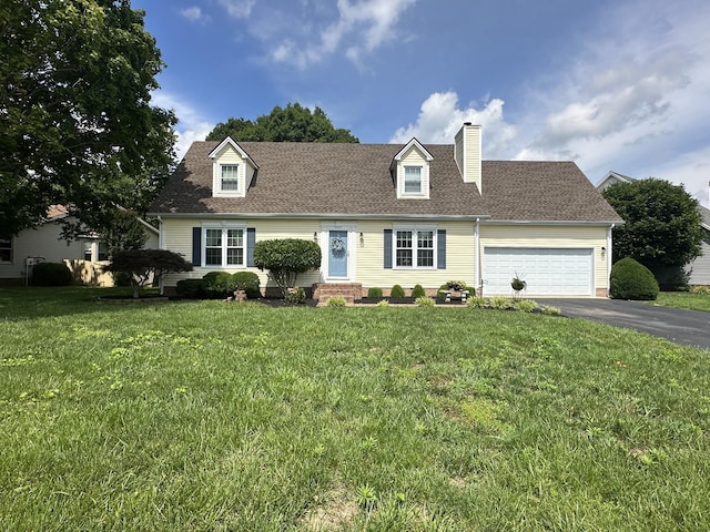 1205 Bark Ridge Cir, Hopkinsville, KY 42240 - cape cod house featuring asphalt driveway, an attached garage, a front yard, a chimney, and entry steps