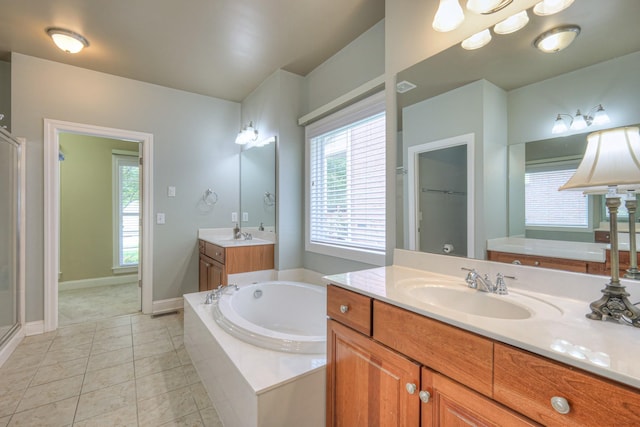 1222 Broadmoor Cir, Franklin, TN 37067 - full bath featuring a bath, a stall shower, vanity, tile patterned floors, and plenty of natural light