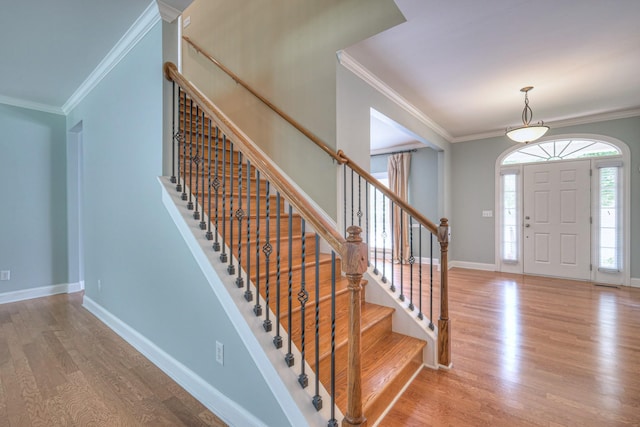 1222 Broadmoor Cir, Franklin, TN 37067 - entryway featuring crown molding, wood finished floors, and stairs