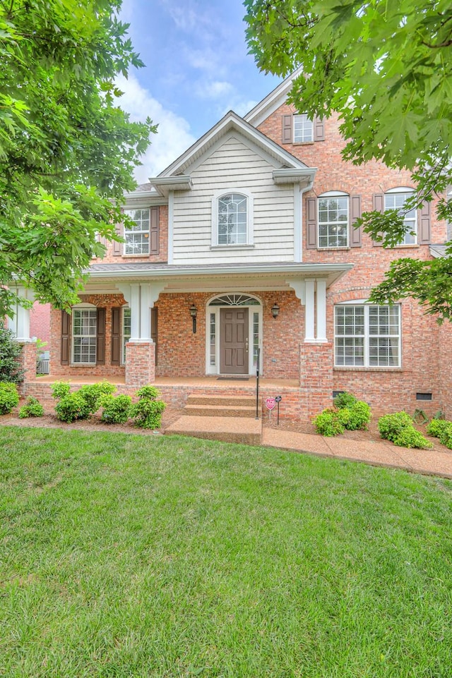 1222 Broadmoor Cir, Franklin, TN 37067 - view of front of property featuring a front lawn and brick siding