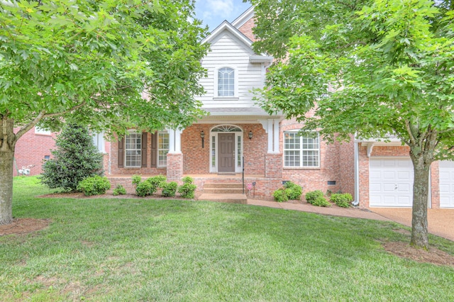 1222 Broadmoor Cir, Franklin, TN 37067 - view of front of house with a front yard, brick siding, a garage, and driveway