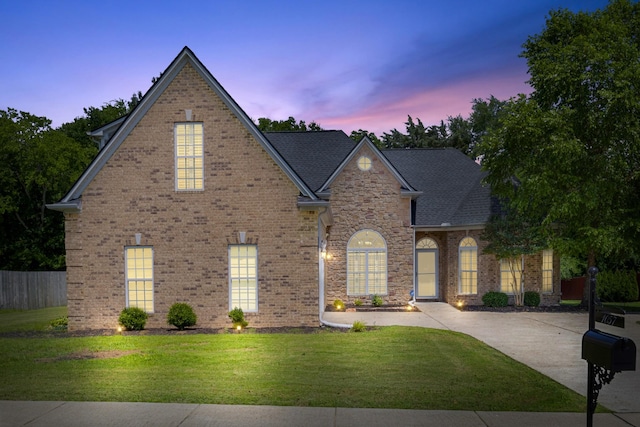 1057 Nealcrest Cir, Spring Hill, TN 37174 - traditional-style home with brick siding and a shingled roof