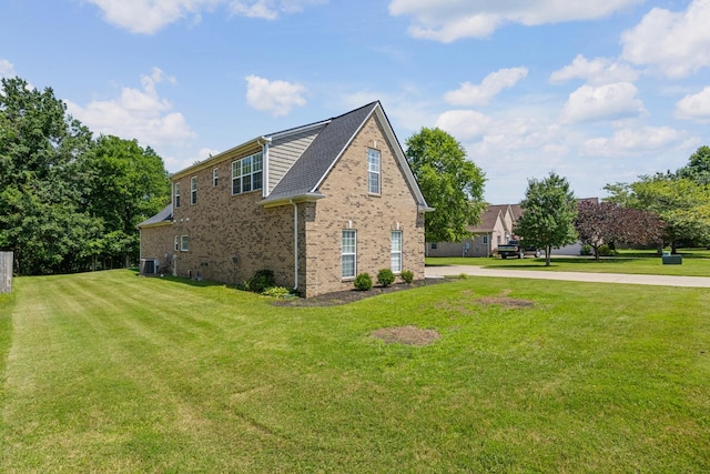 1057 Nealcrest Cir, Spring Hill, TN 37174 - view of side of home featuring brick siding and a yard