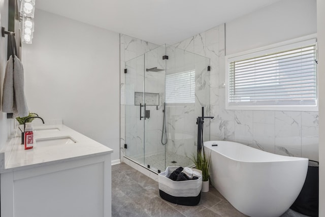1057 Nealcrest Cir, Spring Hill, TN 37174 - full bathroom with a freestanding tub, a marble finish shower, marble finish floors, and double vanity