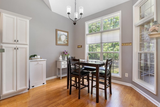 1057 Nealcrest Cir, Spring Hill, TN 37174 - dining area with a chandelier and light wood-style flooring