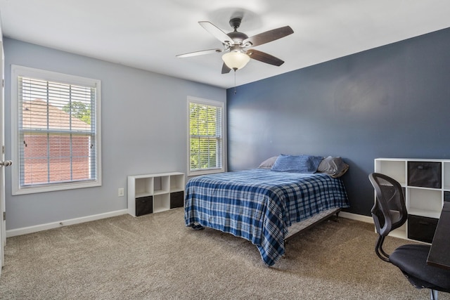 1057 Nealcrest Cir, Spring Hill, TN 37174 - carpeted bedroom featuring a ceiling fan and an office area