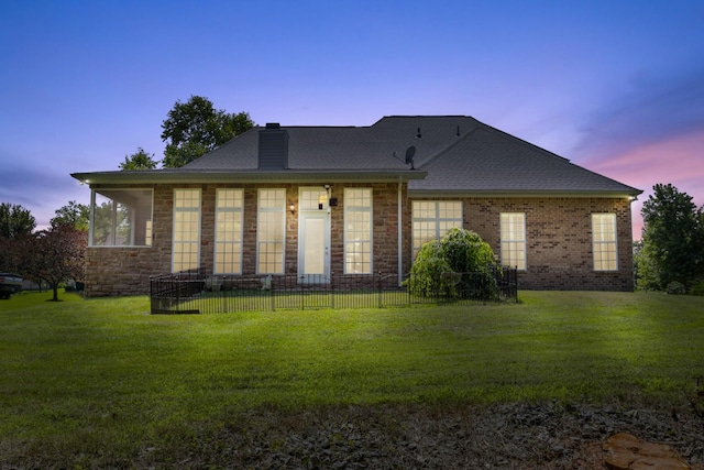 1057 Nealcrest Cir, Spring Hill, TN 37174 - rear view of property featuring a chimney, stone siding, and a shingled roof