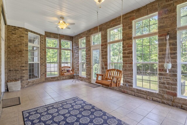 1057 Nealcrest Cir, Spring Hill, TN 37174 - sunroom / solarium with tile patterned floors, ceiling fan, and healthy amount of natural light