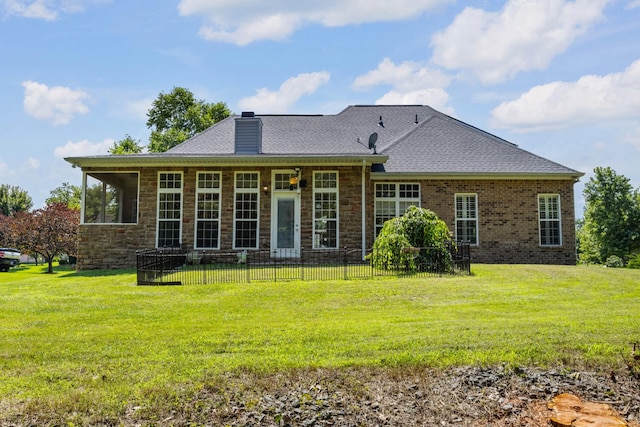 1057 Nealcrest Cir, Spring Hill, TN 37174 - back of property featuring a chimney, stone siding, and a shingled roof
