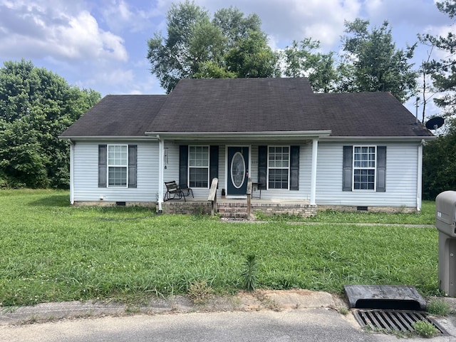119 Boardwalk Way, Shelbyville, TN 37160 - view of front facade featuring crawl space, covered porch, and a front lawn