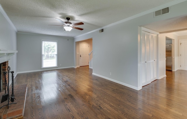 1524 Stone Hill Rd, Mount Juliet, TN 37122 - unfurnished living room with a ceiling fan, ornamental molding, wood finished floors, a textured ceiling, and a fireplace