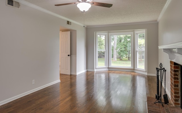 1524 Stone Hill Rd, Mount Juliet, TN 37122 - unfurnished living room with a ceiling fan, plenty of natural light, a brick fireplace, dark wood-type flooring, and a textured ceiling