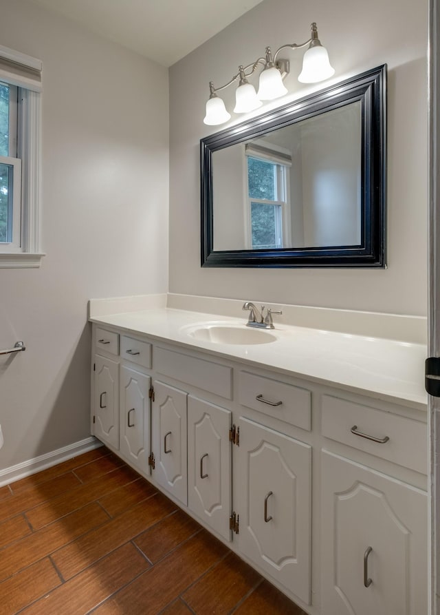 1524 Stone Hill Rd, Mount Juliet, TN 37122 - bathroom featuring vanity, healthy amount of natural light, and wood finished floors