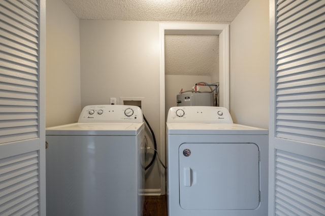 1524 Stone Hill Rd, Mount Juliet, TN 37122 - laundry room with a textured ceiling, washer and clothes dryer, and water heater