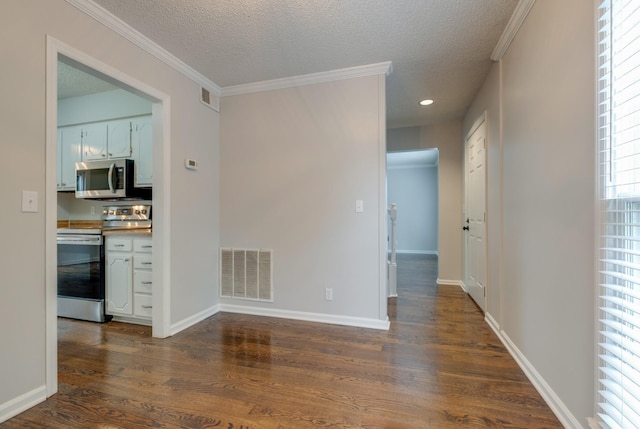 1524 Stone Hill Rd, Mount Juliet, TN 37122 - unfurnished room with a textured ceiling, dark wood-style floors, and ornamental molding