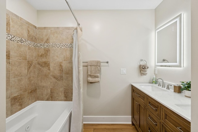 1237 Abiff Rd, Bon Aqua, TN 37025 - full bathroom with a combined bath / shower with jetted tub, double vanity, and wood finished floors